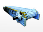 Single arc plate feeder