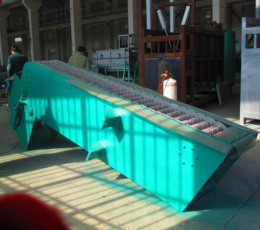 Rotary grille decontamination machine